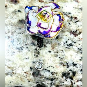 Flower badge reel. Badge pull.